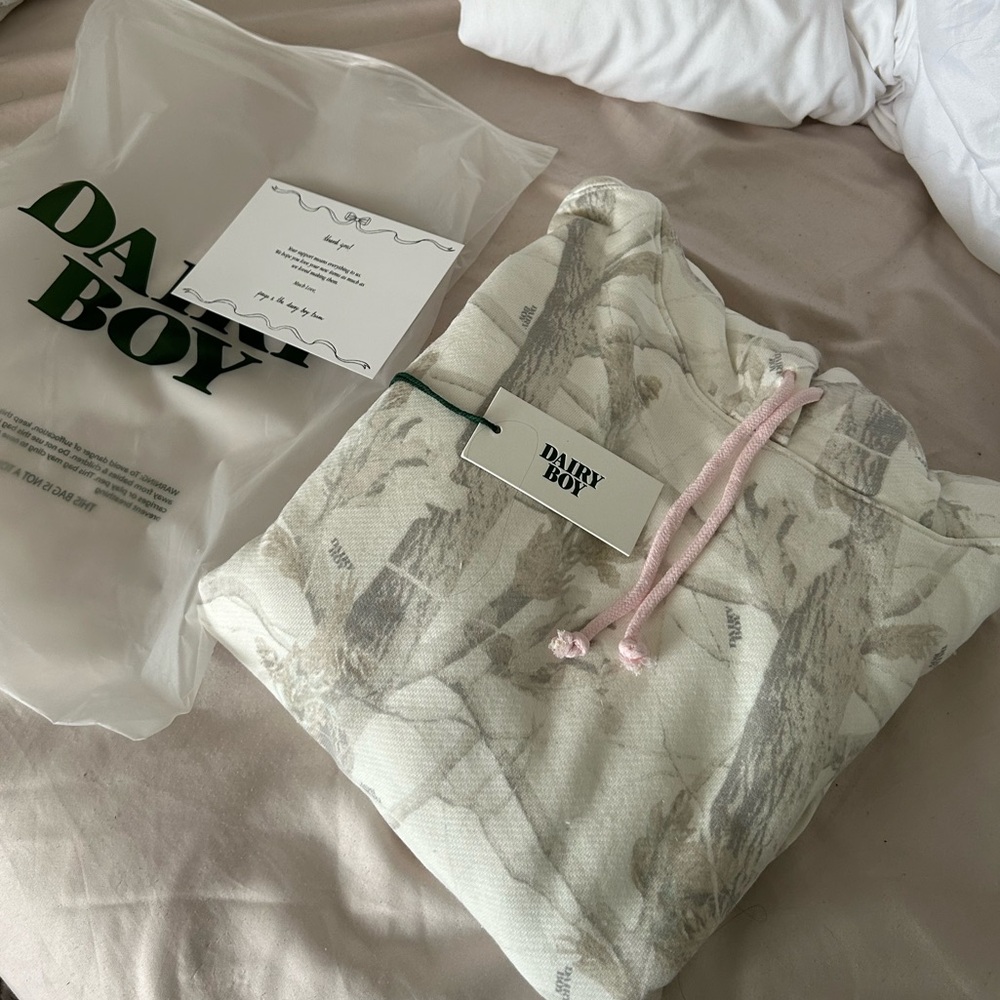 dairy boy, white camo hoodie with pink puffy logo on back